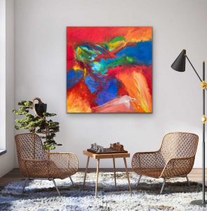 Bold & Beautiful Acrylic Abstract by Red 40" x 40", gallery wrap canvas, Hung in room setting with rattan chairs