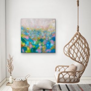 Wildflower Bliss Oil Abstract by Red, 40x40, Gallery Wrap Canvas Hung in casual setting with Hanging wicker chair
