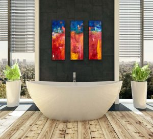 Fiery Trio Acrylic Triptych by Red 3) 36" x 12" On Gallery Wrap Canvas Hung in Bathroom over Soaker Tub