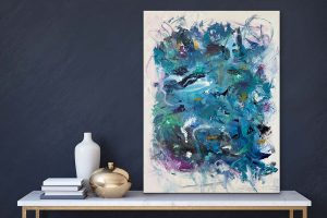 The Happy Artist - Acrylic Abstract by Red on gallery wrap canvas rested on White Console table