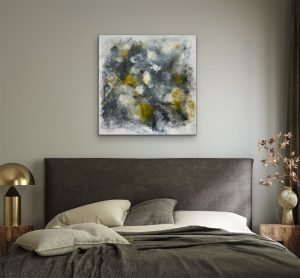 Fireflies in the Mist abstract painting hung over dark brown headboard